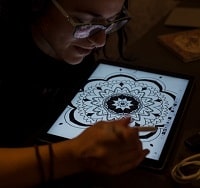 woman using a drawing tablet