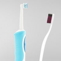 electric toothbrush vs regular tooth brush