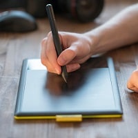 black and yellow drawing tablet